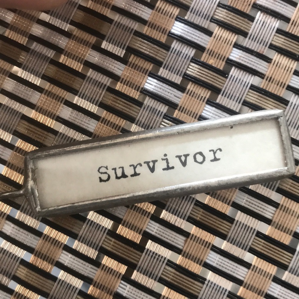 Survivor Charm
